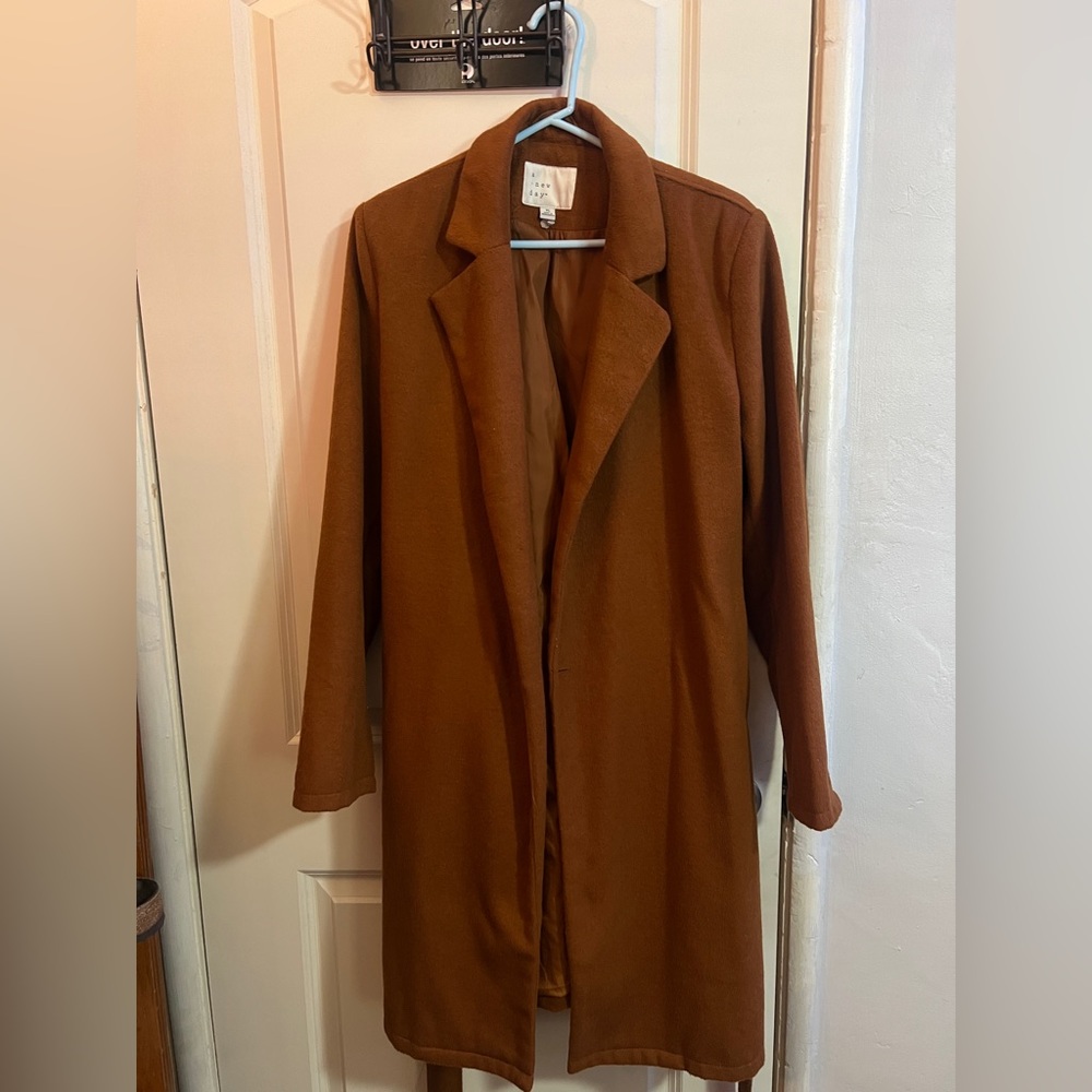 Brown trench coat.